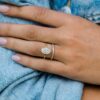 2.7 CT Oval Cut Hidden Halo Moissanite Engagement Ring in 18K Yellow Gold