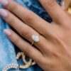 2.7 CT Oval Cut Hidden Halo Moissanite Engagement Ring in 18K Yellow Gold