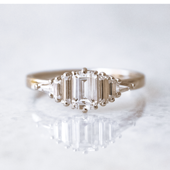 0.60 Emerald Cut Cluster Baguette Moissanite Engagement Ring in 18K White Gold