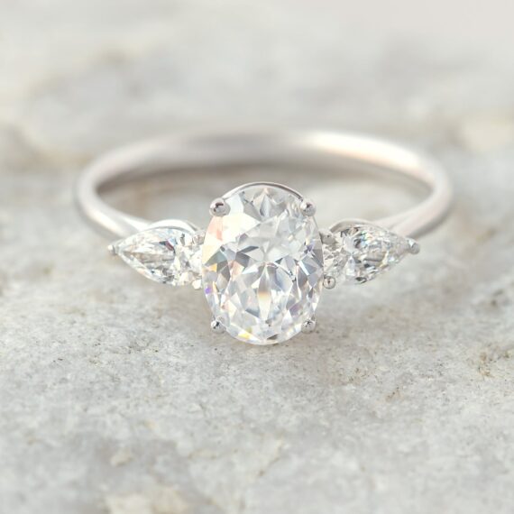 1.33 CT Oval Cut Pear Three Stone Moissanite Engagement Ring in 18K White Gold