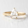1.33 CT Pear Cut Minimalist Pave Setting Moissanite Engagement Ring in 14K Yellow Gold