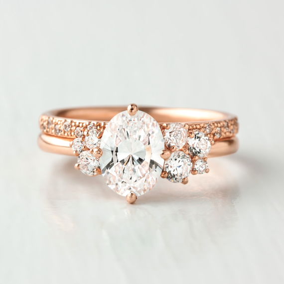 1.33 CT Oval Cut Unique Cluster Moissanite Engagement Ring in 14K Rose Gold